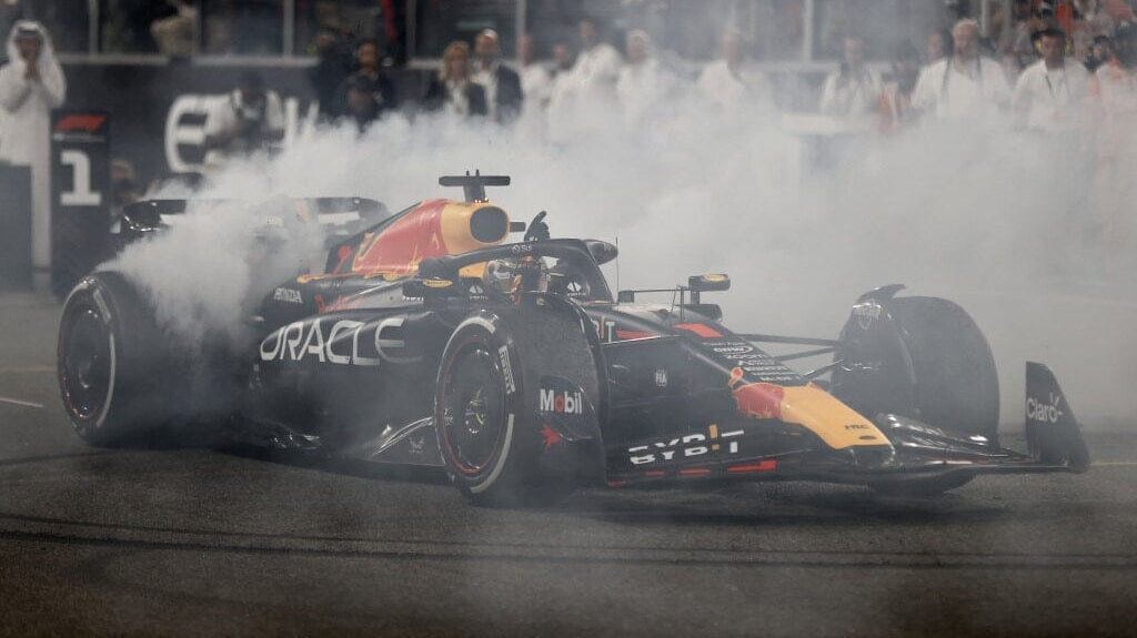 F1 car spinning tires on the track