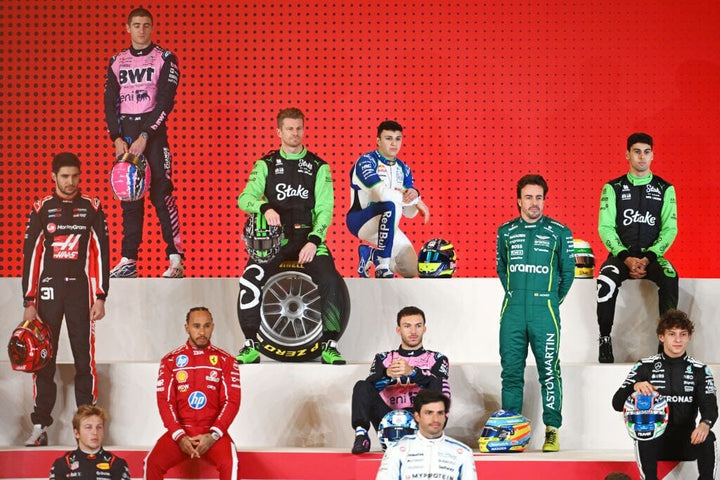 Racers at a photoshoot before a race.