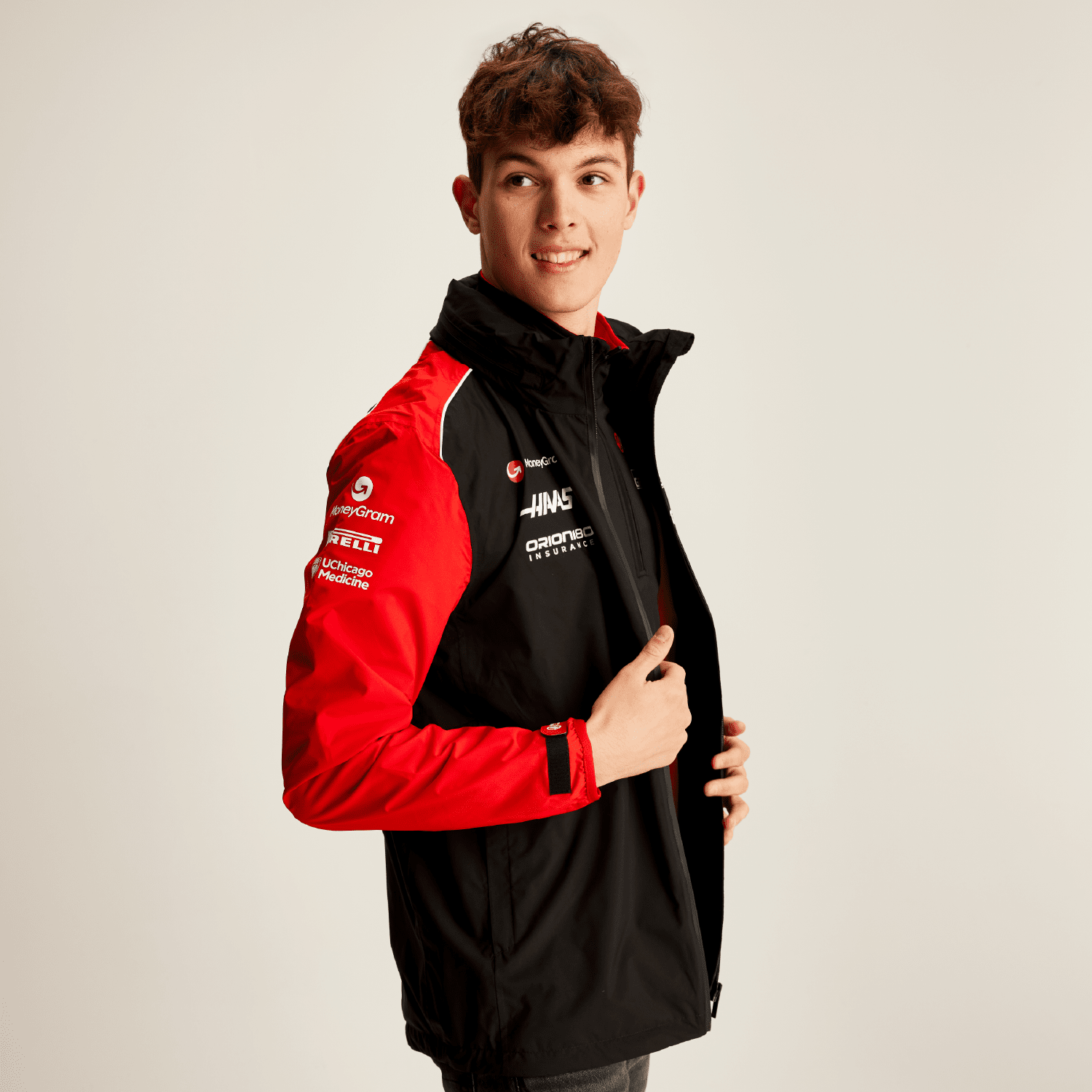 Haas Racing F1 2025 Team Rain Jacket - Black – CMC Motorsports® Haas Racing F1 2025 Team Rain Jacket - Black – CMC Motorsports®
