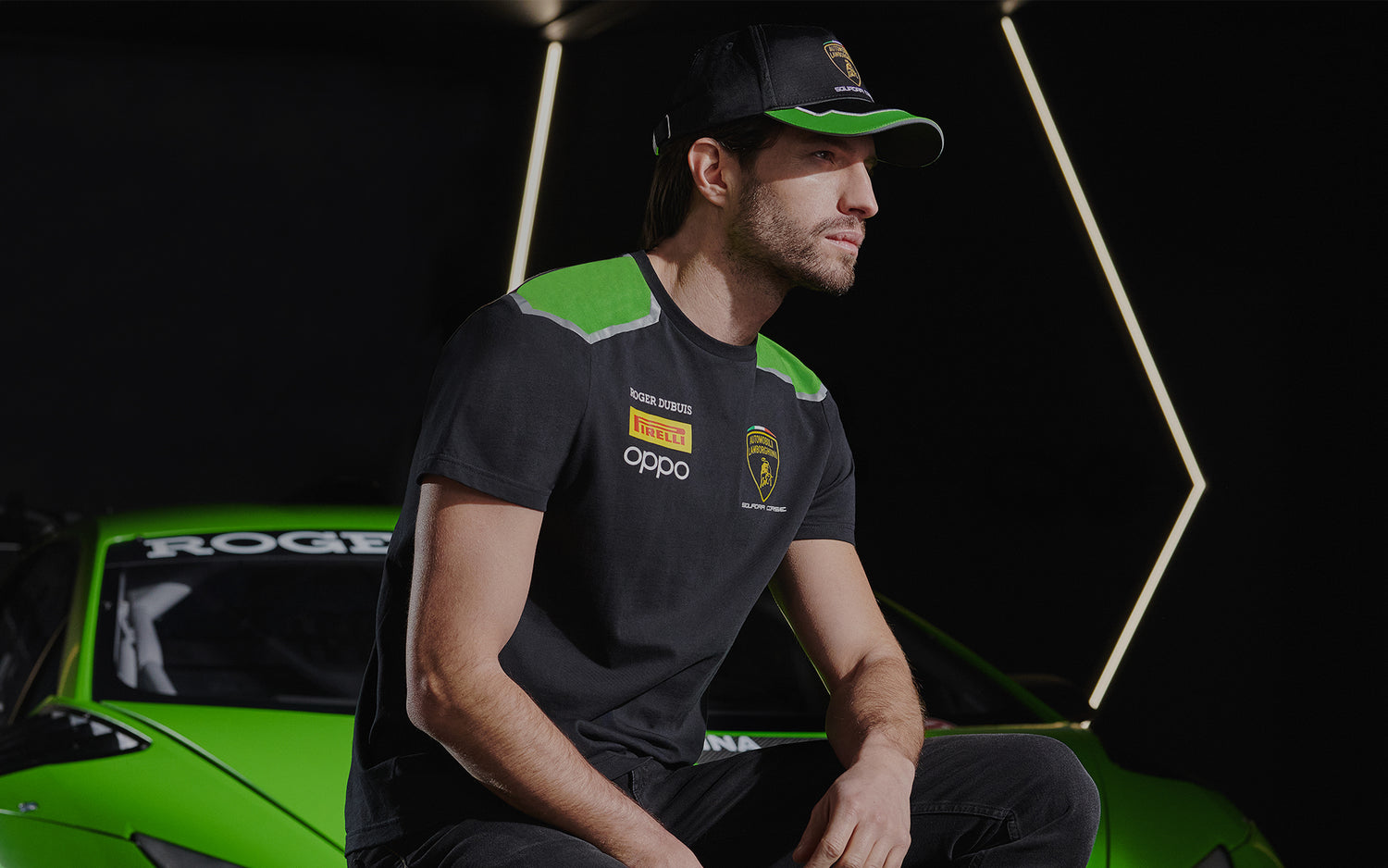 man wearing black and green Lamborghini t-shirt and baseball cap