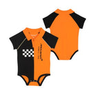 A short-sleeve baby bodysuit shown from both front and back views. The color scheme is bright orange and black, with the front featuring a split design, a black-and-white checkered square on the left, and 'McLaren' printed vertically on the right.